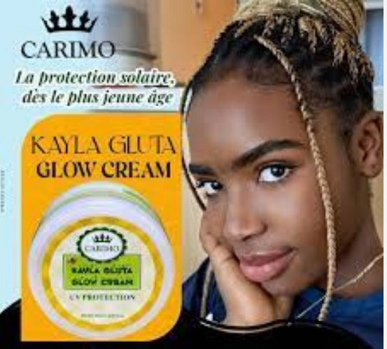 Woman with braided hair next to a box of Carimo Kayla Gluta Glow Cream.