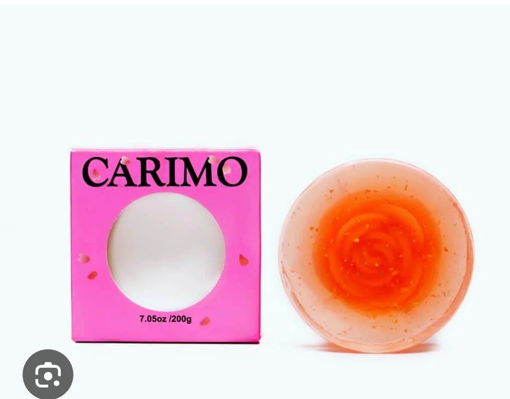 Yap Pink  Soap CARIMO packaging with a white sphere and an orange-brown textured product on a white background